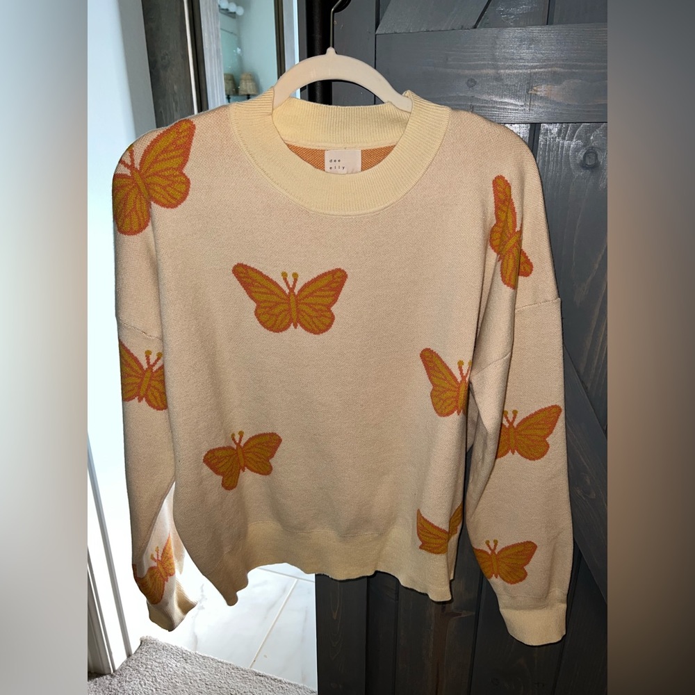 Like new! Butterfly sweater Worn once size large
